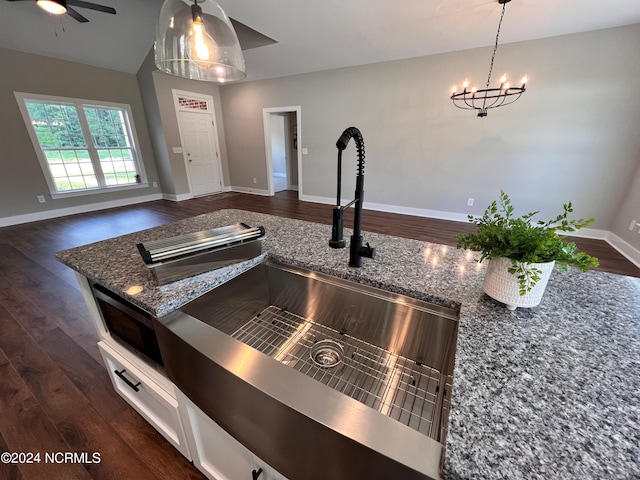 3701 Greystone Dr, Rocky Mount, NC 27804 - kitchen featuring dark wood-style flooring, open floor plan, and stone counters