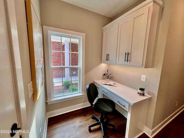 3701 Greystone Dr, Rocky Mount, NC 27804 - office with built in desk, baseboards, and dark wood-style floors