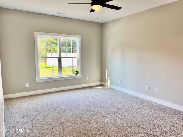 3701 Greystone Dr, Rocky Mount, NC 27804 - empty room featuring carpet flooring, visible vents, baseboards, and ceiling fan