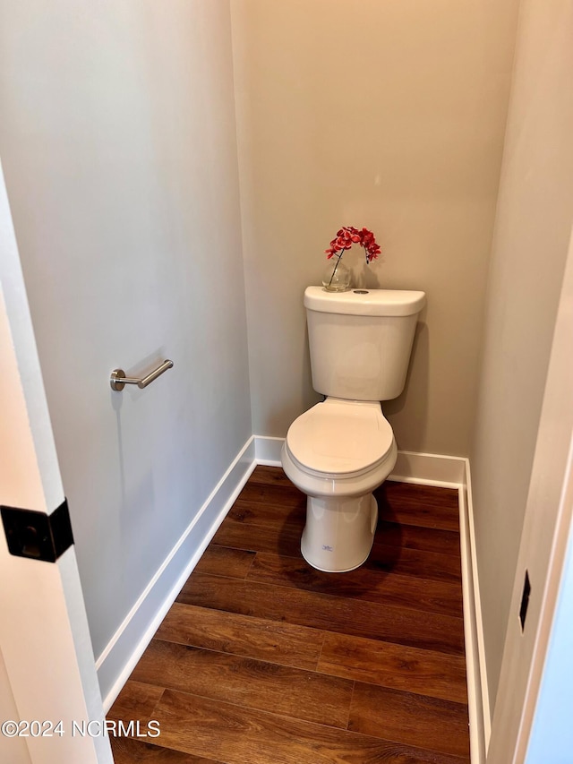 3701 Greystone Dr, Rocky Mount, NC 27804 - bathroom with toilet, baseboards, and wood finished floors