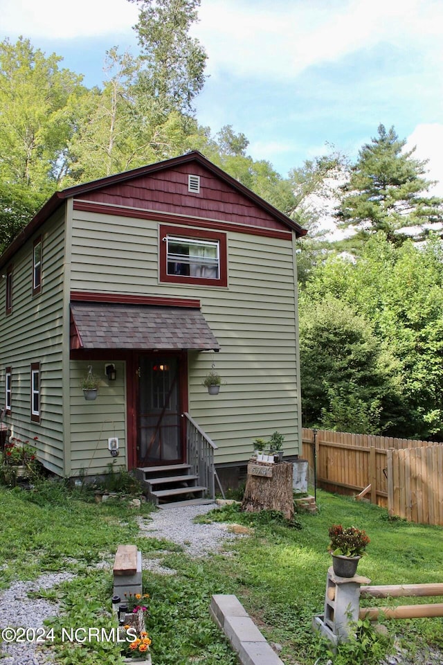 front of property with a front yard