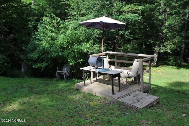 view of yard featuring a deck