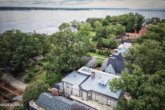 birds eye view of property featuring a water view