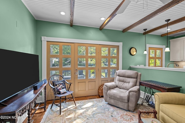 living room with wood ceiling, wood finished floors, beam ceiling, and recessed lighting