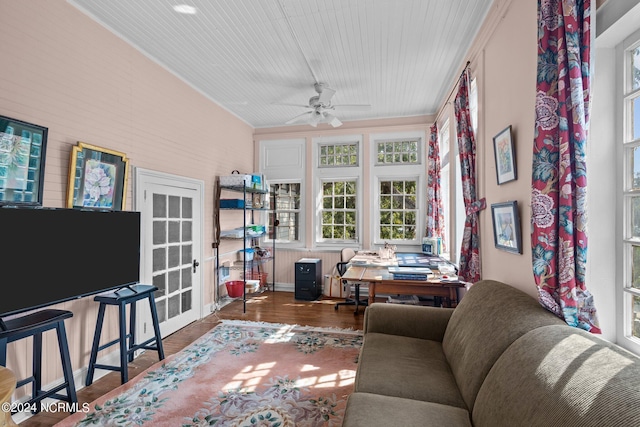 living area with ceiling fan and wood finished floors