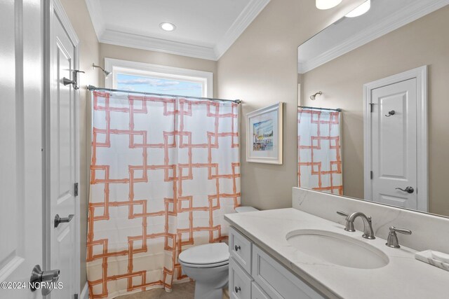 bathroom featuring ornamental molding, a shower with shower curtain, vanity, and toilet