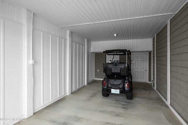 garage featuring metal wall