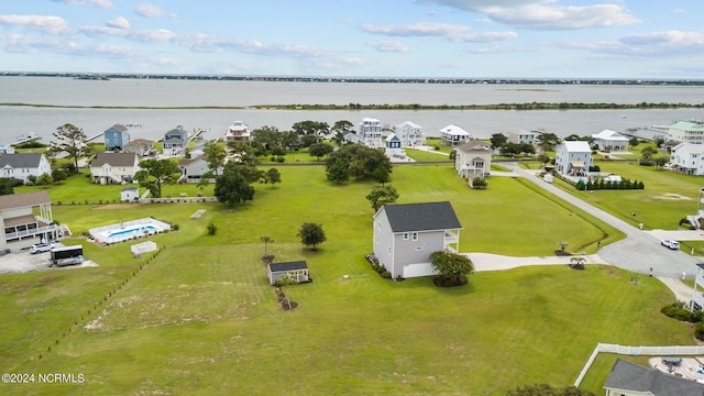 aerial view featuring a water view and a residential view