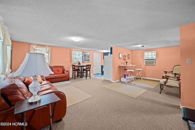 living room with a textured ceiling, light colored carpet, and cooling unit