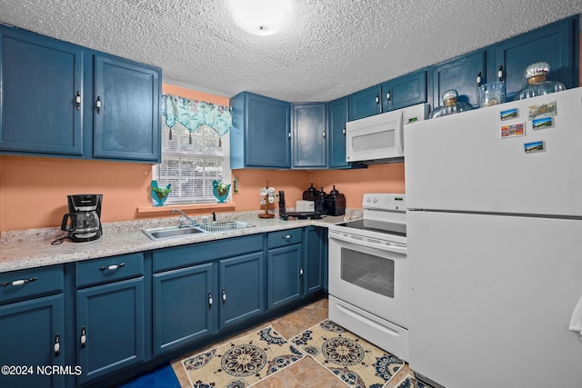 kitchen featuring a textured ceiling, white appliances, sink, and blue cabinetry