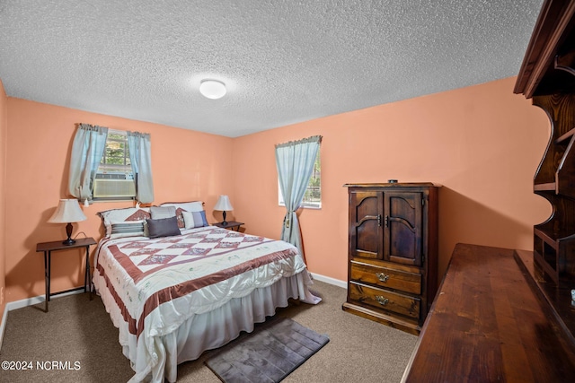 carpeted bedroom with cooling unit and a textured ceiling