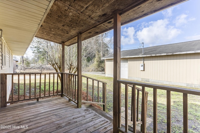 deck featuring a yard