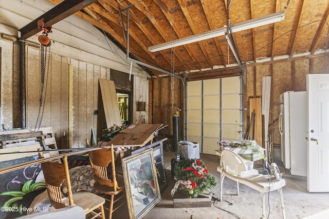 garage with white fridge
