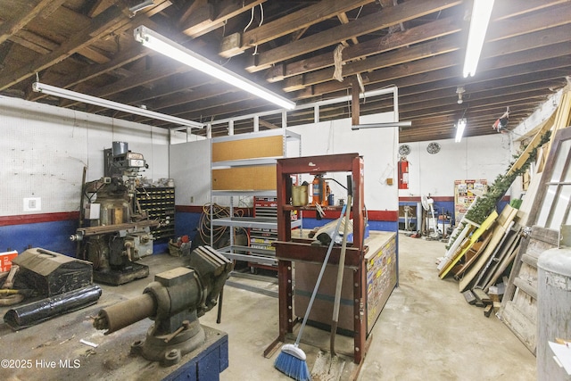 basement with a workshop area