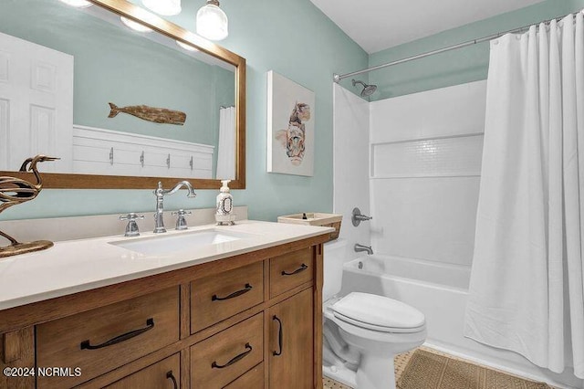 bathroom with toilet, shower / tub combo, and vanity