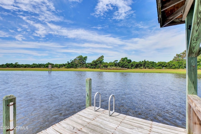 dock area featuring a water view