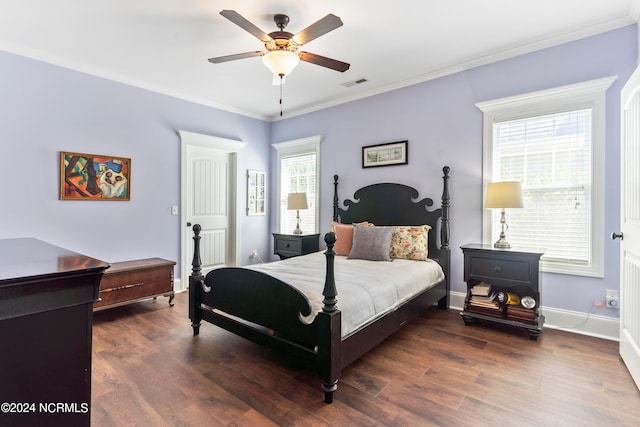 bedroom with ceiling fan, crown molding, and dark hardwood / wood-style flooring