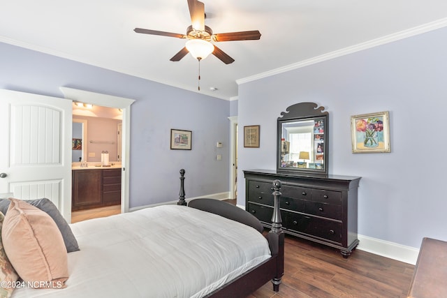 bedroom featuring crown molding, ceiling fan, dark wood-type flooring, and ensuite bathroom