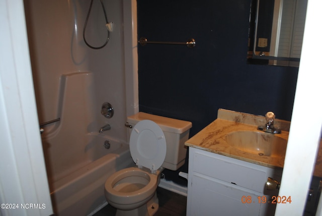 full bathroom with toilet, vanity, and shower / bath combination