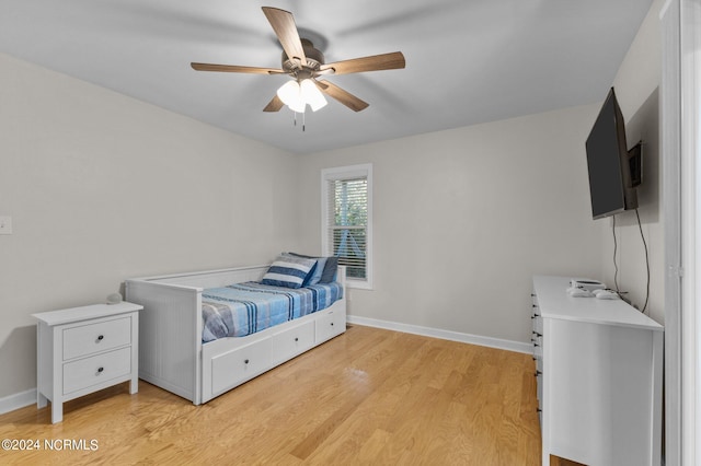 bedroom featuring ceiling fan and light wood-type flooring