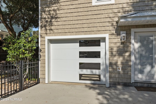 view of exterior entry with a garage