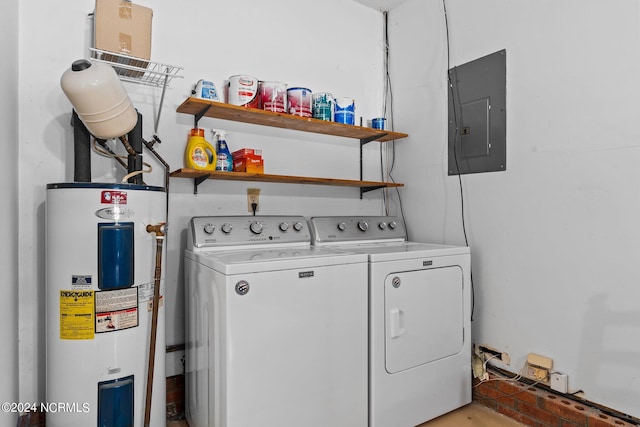 clothes washing area featuring independent washer and dryer, electric panel, and electric water heater