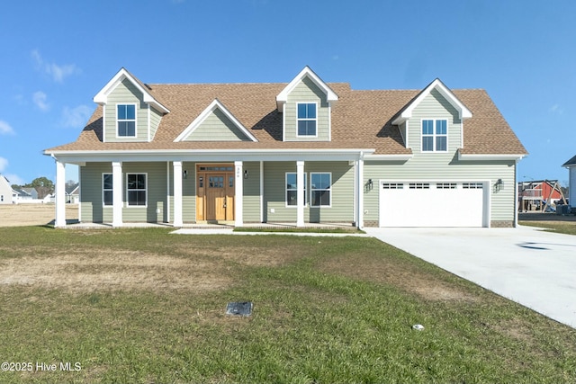 cape cod home with a porch, a garage, and a front lawn