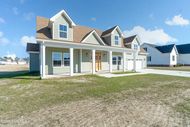 cape cod-style house featuring a front lawn and covered porch