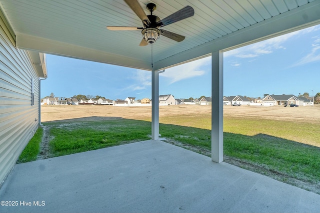 view of patio with ceiling fan