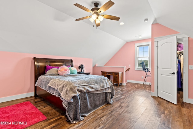 bedroom featuring vaulted ceiling, ceiling fan, and dark hardwood / wood-style flooring