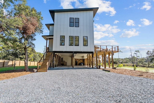 view of front of property with a carport