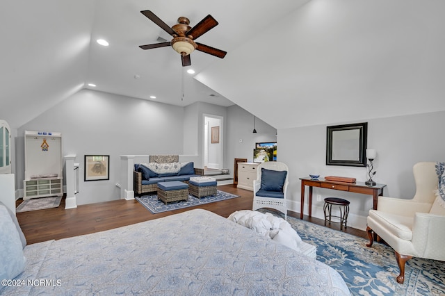 bedroom with lofted ceiling, wood finished floors, and recessed lighting