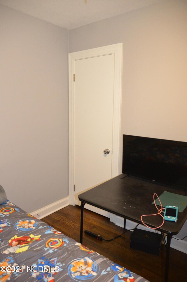 bedroom featuring hardwood / wood-style flooring