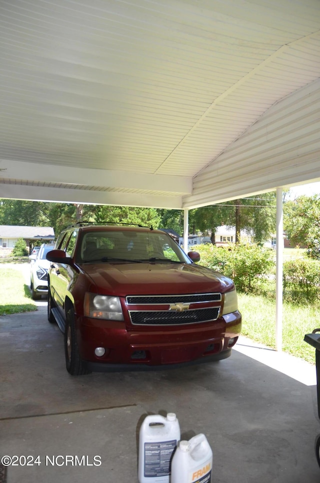 view of parking featuring a carport