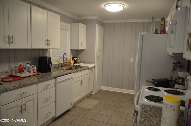 kitchen featuring sink, white appliances, white cabinets, and light tile patterned floors