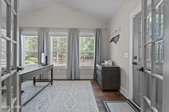 home office with french doors, high vaulted ceiling, and dark hardwood / wood-style floors