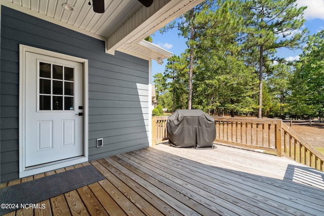 wooden deck with area for grilling