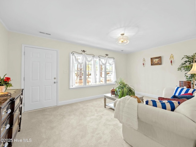 carpeted living room featuring baseboards and visible vents