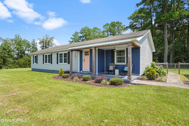 view of front of house featuring a front lawn and a porch