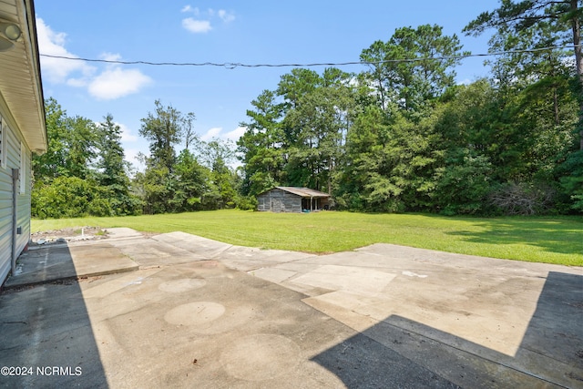 view of patio / terrace with an outdoor structure