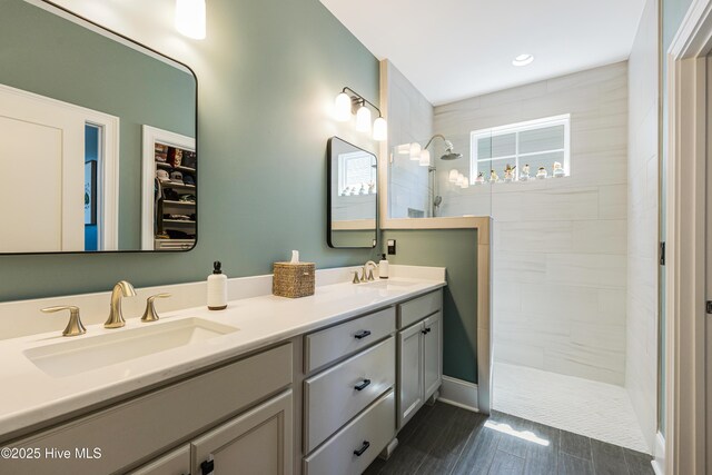 600 Planters Ridge Dr, Sunset Beach, NC 28468 - bathroom with double vanity, a sink, and walk in shower