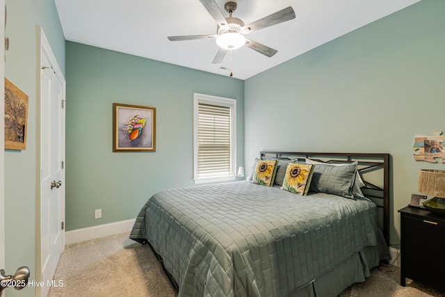 600 Planters Ridge Dr, Sunset Beach, NC 28468 - carpeted bedroom with baseboards and ceiling fan