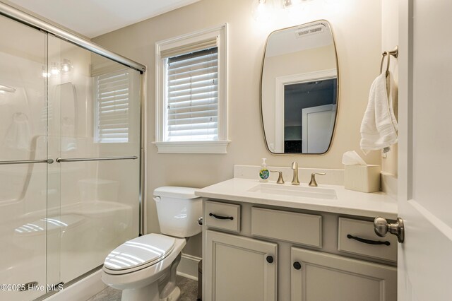 600 Planters Ridge Dr, Sunset Beach, NC 28468 - full bathroom featuring vanity, toilet, and a shower stall