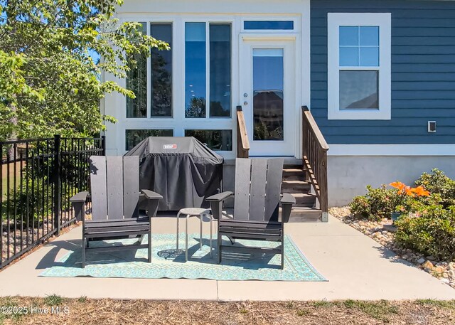 600 Planters Ridge Dr, Sunset Beach, NC 28468 - view of patio with fence and a grill