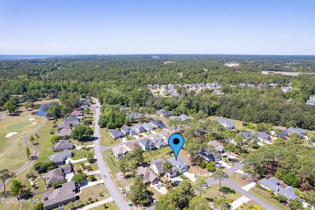 600 Planters Ridge Dr, Sunset Beach, NC 28468 - drone / aerial view featuring a forest view and a residential view