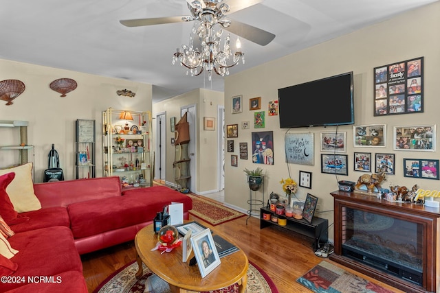 living room featuring ceiling fan and wood finished floors