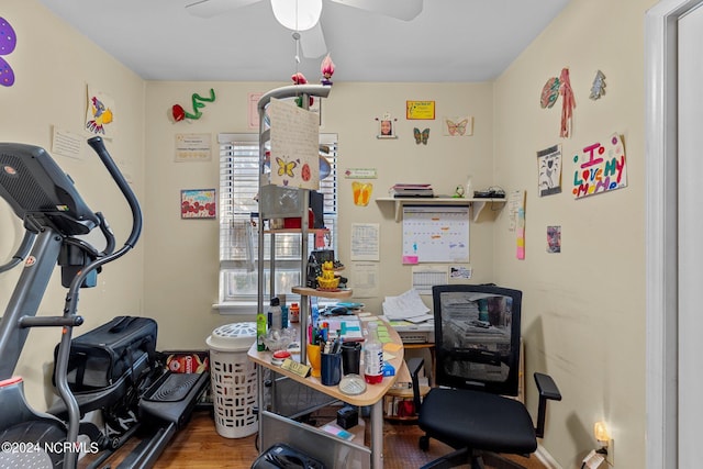 interior space featuring ceiling fan and wood finished floors