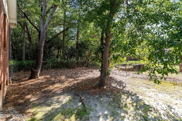 view of yard featuring fence