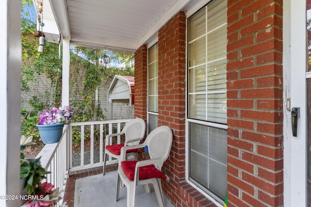 balcony featuring a porch