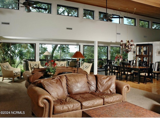 7422 Sea Lilly Ln, Wilmington, NC 28409 - living area with plenty of natural light, a high ceiling, a notable chandelier, and visible vents